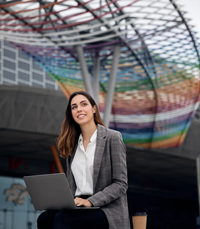 Medium shot woman with laptop